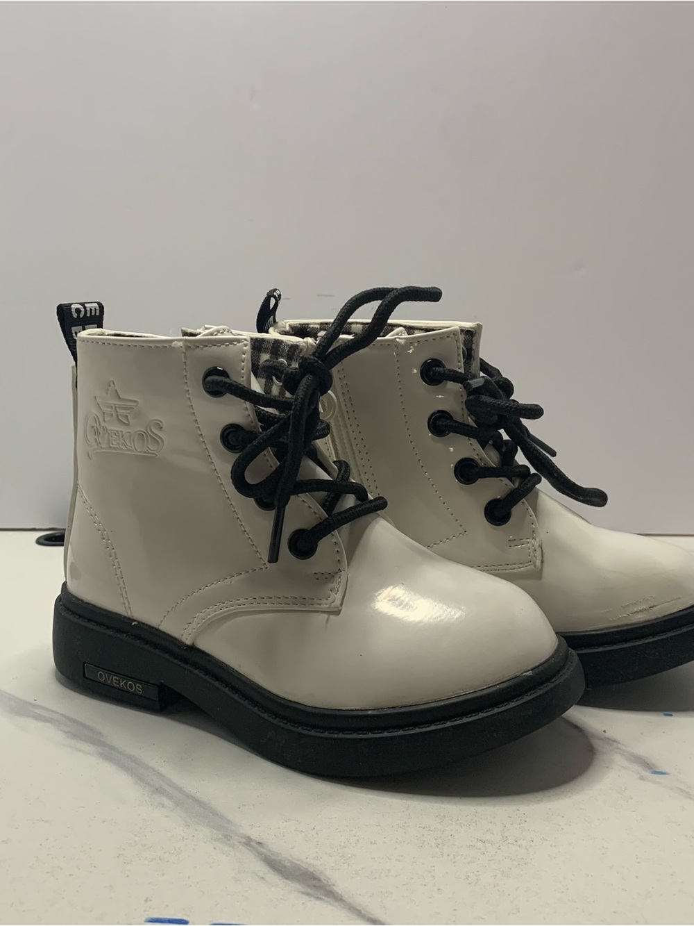 Ovekos White Lace-Up Ankle Boots with Black Soles